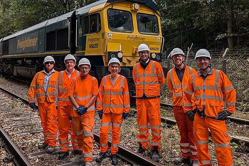 Lisa Smart MP inspects the rail freight delivery at the at the Tarmac site in Bredbury 
