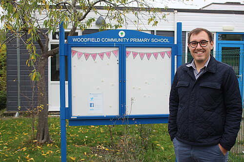 Tom Gordon MP stood outside Woodfield primary school
