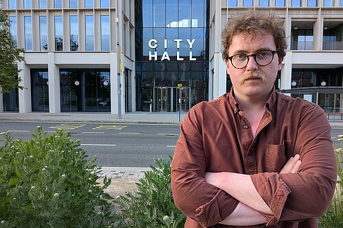 Ciaran Morrissey standing with his arms folded outside Sunderland City Hall