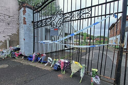 Flowers at the gate of Fairfield estate