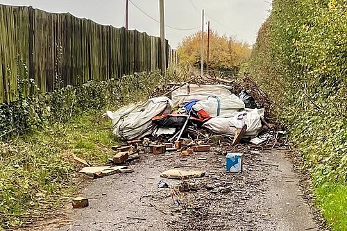 Fly tipping in country lane