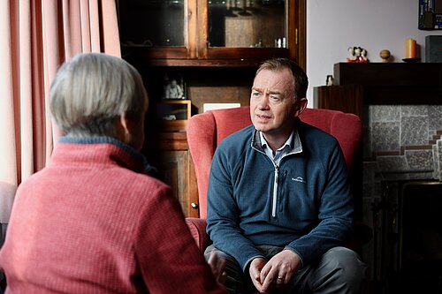 Tim listening to a local resident