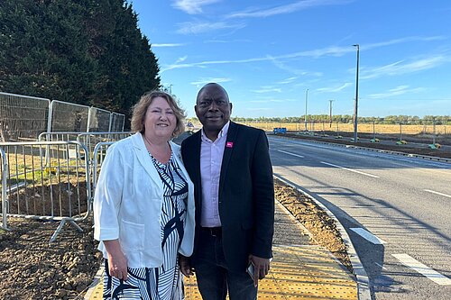 Councillor Jane Carr and Councillor Tony Oyakhire by the newly opened A509