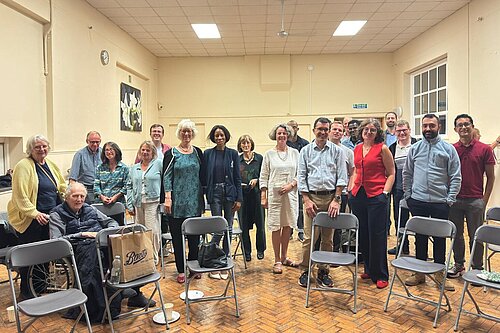 Attendees with Mike at the event