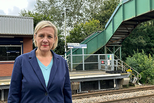 MP Lisa Smart at Bredbury Station where there is only stepped access from one platform to the other