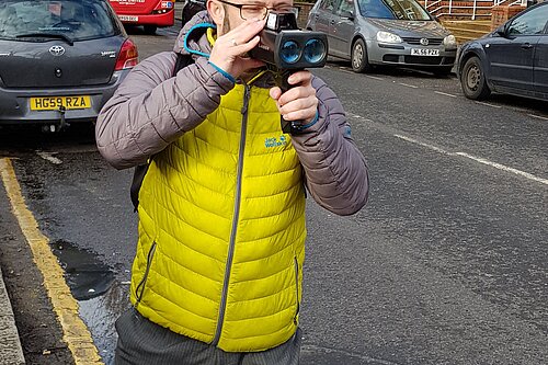 Cllr Gary Malcolm conducting speed checks on The Avenue.