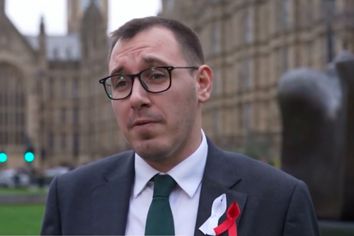 Tom Gordon stood outside the Houses of Parliament
