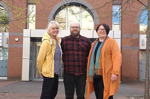 Reading Lib Dem councillors Meri O'Connell, James Moore, and Anne Thompson, outside the Reading Borough Council offices