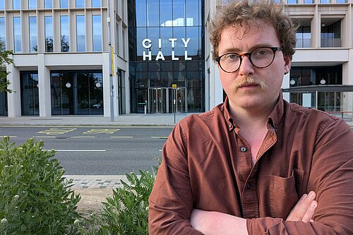 Ciaran Morrissey standing with his arms crossed outside Sunderland City Hall