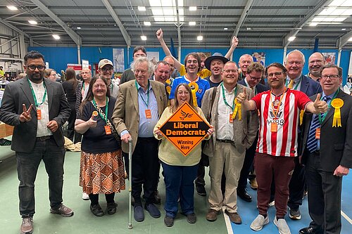Liberal Democrat candidates cheering at the Sunderland election count 2026