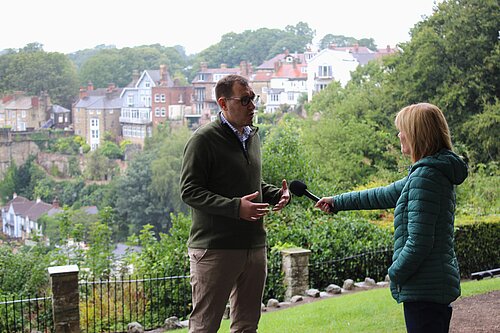 Tom Gordon MP speaking to a reporter in Kmaresborough