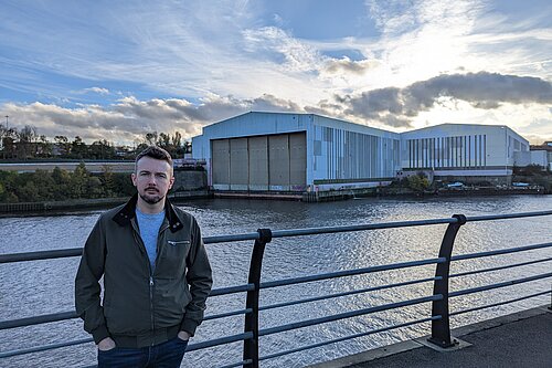 Martin Haswell standing next to the River Wear opposite the Crown Works Studios site