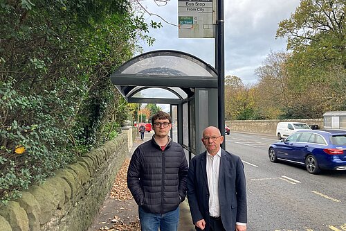 Local Lib Dem councillors at a bus stop