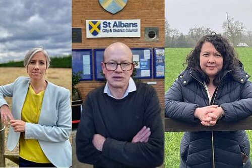 The image is split into three photos. The photo on the left is of Daisy Cooper MP, standing in front of an open space and looking directly at the camera. The middle photo is of councillor Paul de Kort, standing in front of the St Albans District Council building and staring directly at the camera with a serious expression. The photo on the right is of Victoria Collins MP, standing in front of a green space.