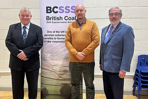 Cameron Thomas stands with members of the British Coal Staff Superannuation Scheme