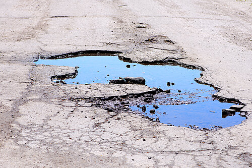 Road with potholes