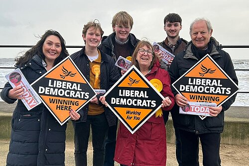 Alison Barnes and team with placards and leaflets