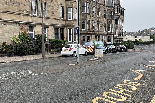 Traffic island with broken signage