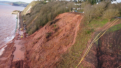 image of cliff fall onto railway