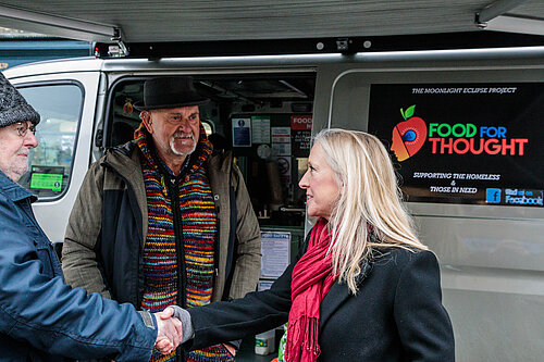 Roz shaking hands with a constituent