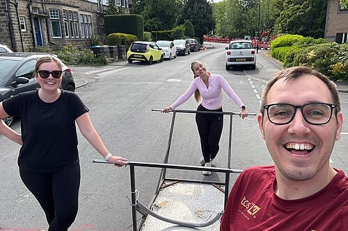 Tom Gordon with members of his staff team and the bed race bed
