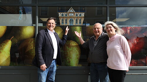 Image of people with ditto house