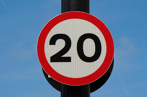Twenty miles per hour speed sign.
