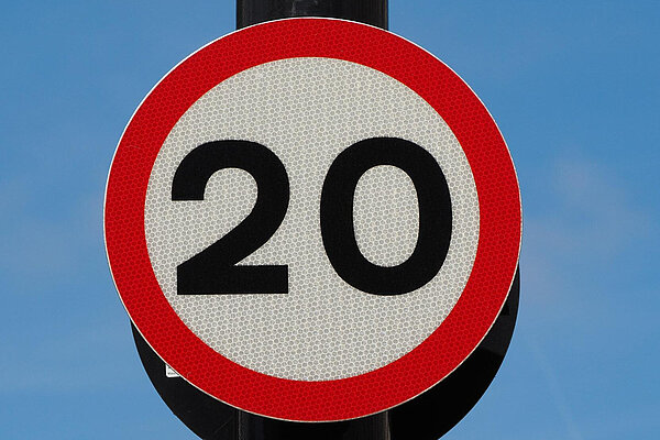 Twenty miles per hour speed sign.