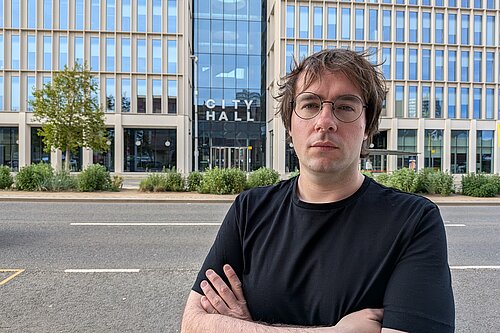 Paul Edgeworth standing with arms folded outside City Hall, Sunderland