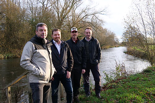 Danny at river with people