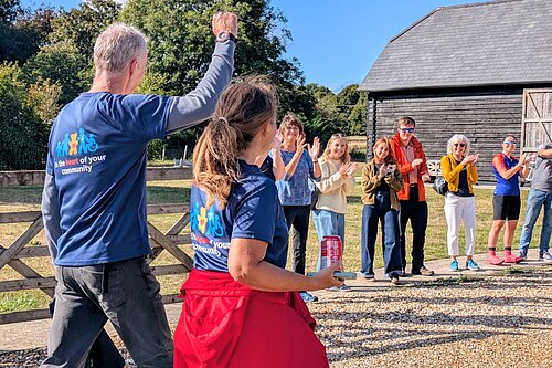 Vikki Slade and Martin Edwards crossing the finish line of their alternative triathlon