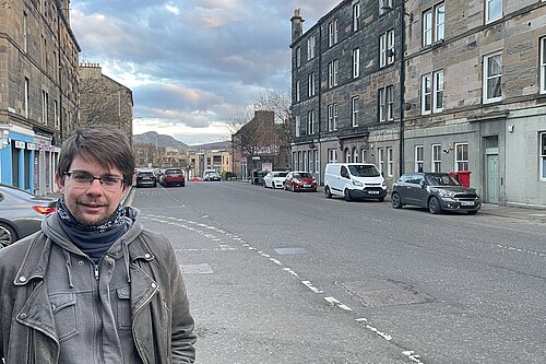 Jack Caldwell standing by a wide road