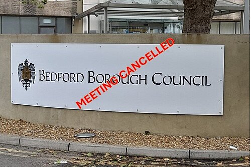 borough hall sign with meeting cancelled on it
