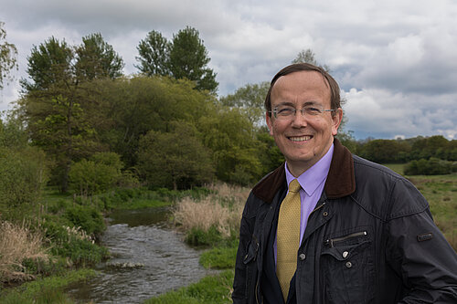 Martin Tod in front of the River Meon