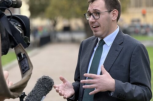 Tom Gordon talking to a Camera